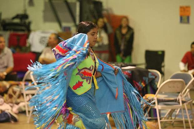 Eleven-year-old Chandra Smith participates in an inter-tribal dance at the La Ka Le&#039;l Be Powwow on Friday.