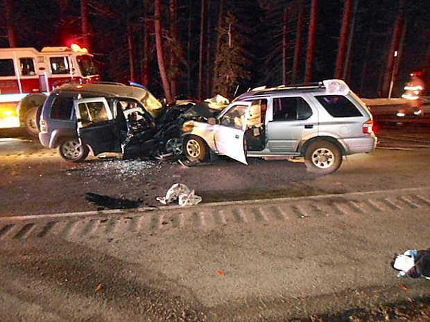 Officials investigate the scene of the accident Thursday evening on Highway 431 north of Lake Tahoe.