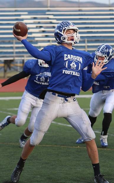 Carson quarterback Joe Nelson tosses a pass at practice last season.