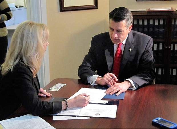 Gov. Brian Sandoval said last week he and his staff are aware the budget frowingmore than what state coiffers are taking in.