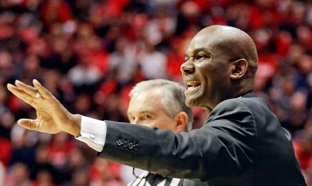 Nevada coach David Carter calls to his team during the first half of an NCAA college basketball game against San Diego State, Saturday, Feb. 8, 2014, in San Diego. (AP Photo/Lenny Ignelzi)