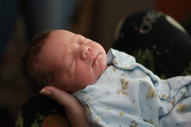 Aiden Tait was born to Shehekea Tait early Friday morning to be the first baby born at Carson Tahoe Health in 2014.