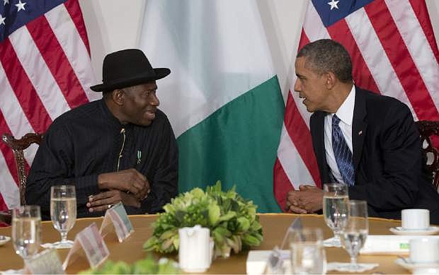 FILE - President Barack Obama meets with Nigerian President Goodluck Jonathan in New York, in this Monday, Sept. 23, 2013 file photo.  The Associated Press on Monday Jan. 13 2014  obtained a copy of the previously unannounced Same Sex Marriage Prohibition Act  that was signed by President  Jonathan and dated Jan. 7 that bans same-sex marriage and criminalizes homosexual associations, societies and meetings, with penalties of up to 14 years in jail. Secretary of State John Kerry said Monday the United States was &quot;deeply concerned&quot; by a law that &quot;dangerously restricts freedom of assembly, association, and expression for all Nigerians.&quot; (AP Photo/Pablo Martinez Monsivais, File)