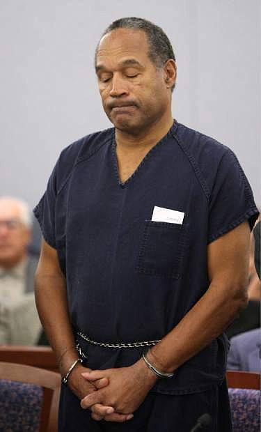 FILE - In this Dec. 5, 2008, file photo, O.J. Simpson appears during his sentencing hearing at the Clark County Regional Justice Center in Las Vegas. Simpson has lost his latest appeal of his 2008 kidnapping and armed robbery conviction in Las Vegas. A three-member Nevada Supreme Court panel ruled Thursday, Sept. 10, 2015, there&#039;s no reason to grant him a new trial. (AP Photo/Isaac Brekken, Pool, File, Pool)