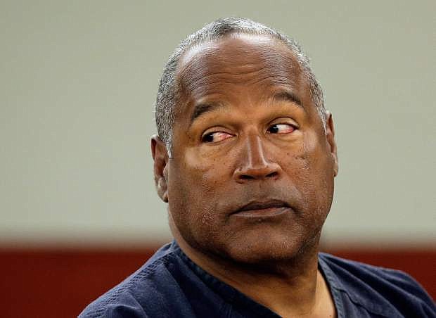 FILE - This May 13, 2013 file photo shows O.J. Simpson at an evidentiary hearing in Clark County District Court, in Las Vegas. Simpson&#039;s lawyers have until mid-April to file their written Nevada Supreme Court appeal for a new trial for the former football star in his Las Vegas armed robbery case. (AP Photo/Julie Jacobson, Pool, file)