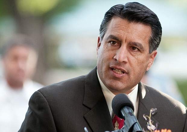 FILE - In this Sept. 25, 2011 file photo Nevada Gov. Brian Sandoval speaks during a memorial service in Reno, Nev.  Sandoval said Saturday, Sept. 21, 2013,  President Obama and Congress should learn from him and other Republican governors who have put aside partisanship to work with Democratic lawmakers to grow their economies through spending cuts and business tax exemptions. &quot;Like Washington, Nevada has a politically divided government, but that hasn&#039;t stopped our efforts to grow Nevada&#039;s economy,&#039;&#039; Sandoval said in the GOP&#039;s response to Obama&#039;s weekly radio address. (AP Photo/Kevin Clifford,File)