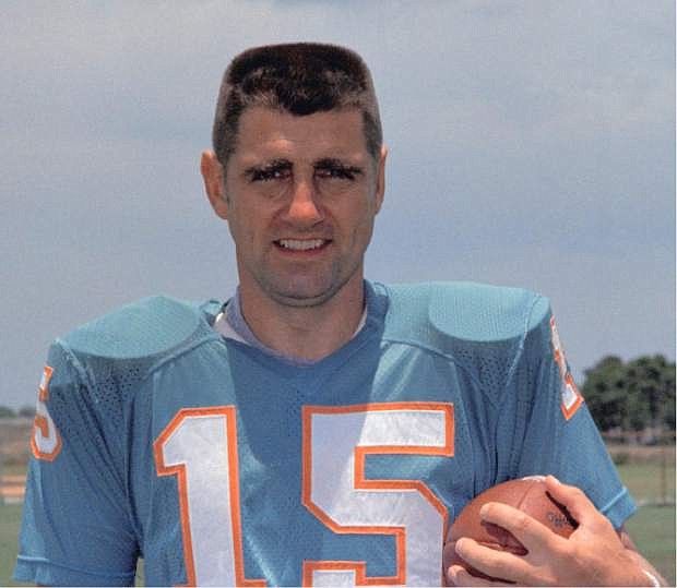 FILE - This is a 1972 file photo showing Miami Dolphins quarterback Earl Morrall. Morrall, an NFL quarterback for 21 years who started nine games during the Miami Dolphins&#039; perfect season in 1972, has died at age 79. The Dolphins confirmed Morrall&#039;s death Friday, April 25, 2014.  (AP Photo/File)