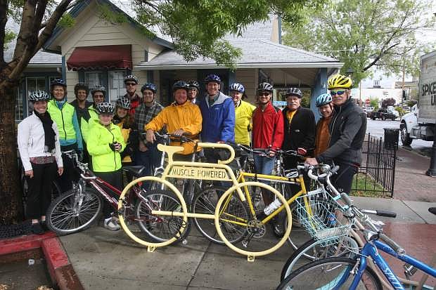 Community leaders take a bike ride Tuesday morning hosted by Muscle Powered to promote National Bike Month. A variety of events are planned throughout the month, including Bike to Work Week starting Monday.