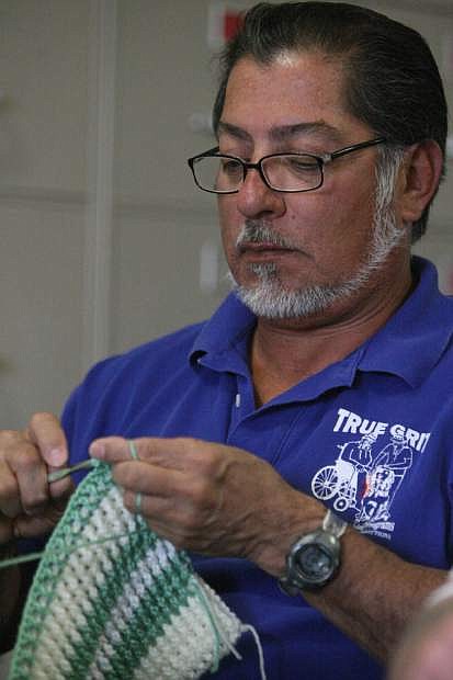 Sixty-one-year-old Steve crochets on Wednesday at Northern Nevada Correctional Center.