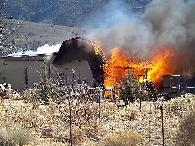 Mike Cassidy of Carson City sent in this photo of the outbuidling burining in Mound House on Friday. According to the Central Lyon County Fire District the fire started about 12:30 p.m. No other structures were threatened and no injuries were reported.