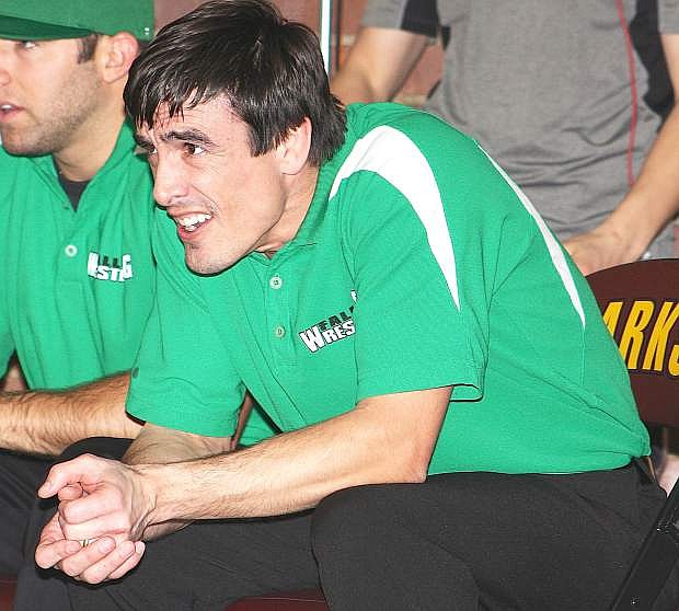 Fallon wrestling coach Mitch Overlie watches a match when he guided the Greenwave.