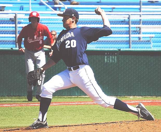 Nevada shortstop Kyle Hunt tags out New Mexico&#039;s Chase Harris during Saturday&#039;s game at Peccole Park in Reno. The Wolf Pack lost, 7-2, and were swept by the Lobos in the three-game series.