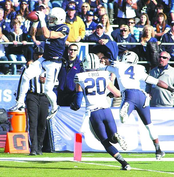Nevada receiver Richy Turner hauls in a pass but does not stand in bounds during Saturday&#039;s 28-23 loss to BYU at Mackay Stadium in Reno.