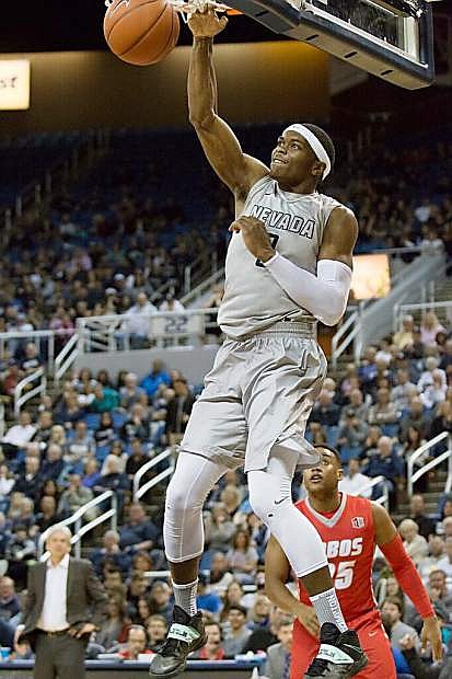 Cameron Oliver dunks for Nevada against New Mexico on Saturday, March 5, at Lawlor Events Center.