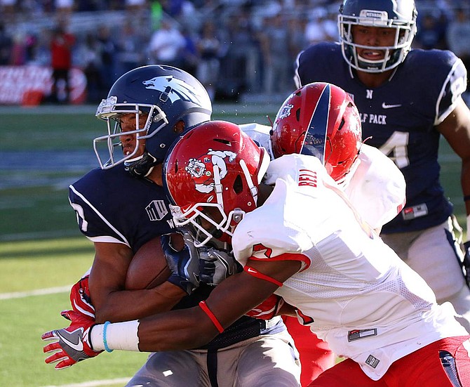 Wyatt Demps makes a reception for Nevada on Saturday against Fresno State at Mackay Stadium.