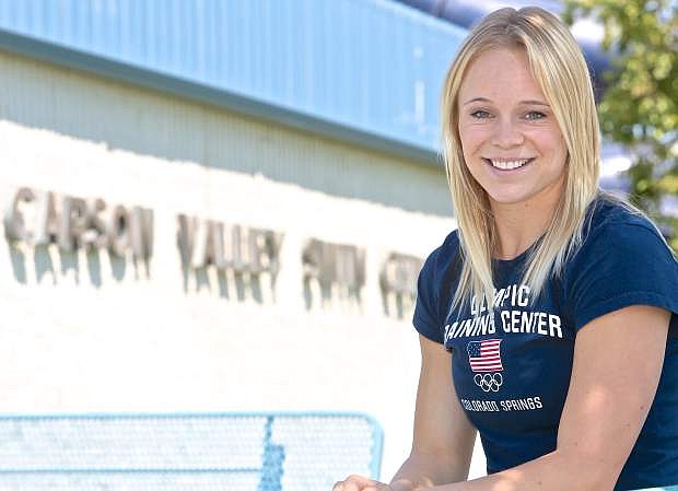Krysta Palmer on what has been a successful athletic career during an interview Wednesday at the Carson Valley Swim Center.