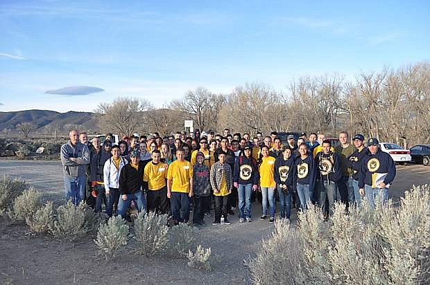 Carson High School ROTC sent 70 students to volunteer on Saturday with the Carson City Open Space Program and River Wranglers. The students wrapped chicken wire around 00 cottonwood trees and protect them from beaver damage at the Ambrose Carson River Natural Area.
