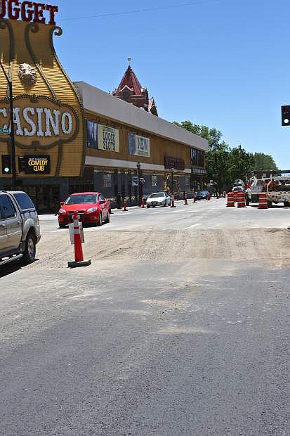 The first phase of the paving of Carson St. in downtown finishes at Robinson St. in front of the Nugget.