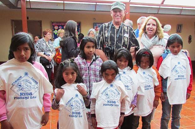 Travis and Lu Skaggs of Carson City presented the girls at the Hogar Mercedes de Jesus Molina Religiosas Marianitas Orphanage with T-shirts donated by the Carson Lions during their recent excursion to Peru. The orphanage, located in a small village just outside of Cusco, is home to 15 young girls and is sponsored by the Collette Vacations Foundation.