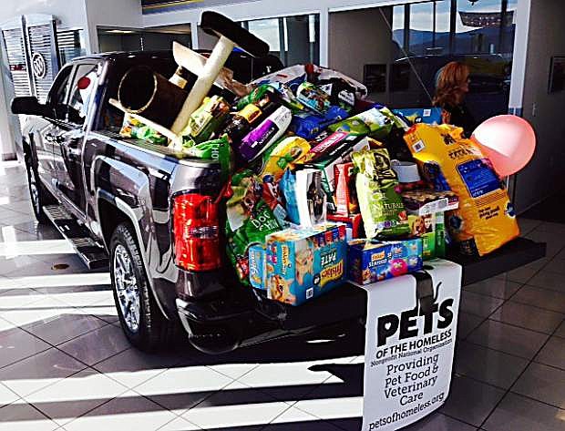 Michael Hohl Motor Company is holding its second annual Give a Dog a Bone pet food drive to fill a pickup for Pets of the Homeless, a nonprofit that provides pet food and basic emergency veterinary care to homeless pets.