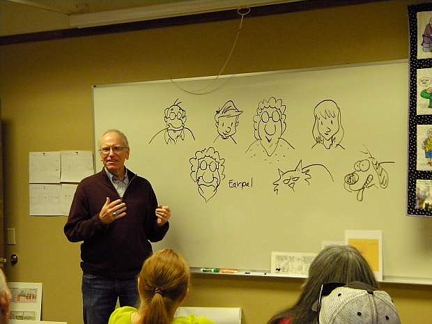 Pickles cartoonist Brian Crane draws and discusses his comic strip characters for an audience at Dayton Branch Library.