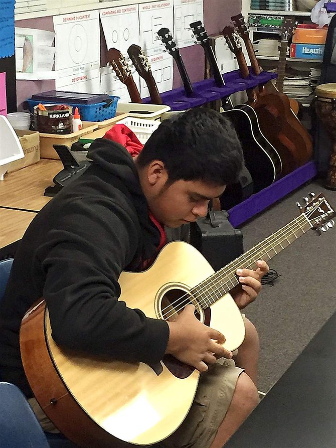 Pioneer High School is offering two sections of guitar this year to students.