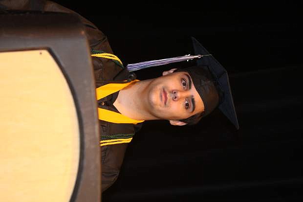 Pioneer High Valedictorian Matthew Linder addresses the commencement crowd at the Carson City Community Center.