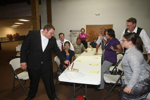 The cast of &quot;12 Angry Jurors&quot; rehearse a scene.