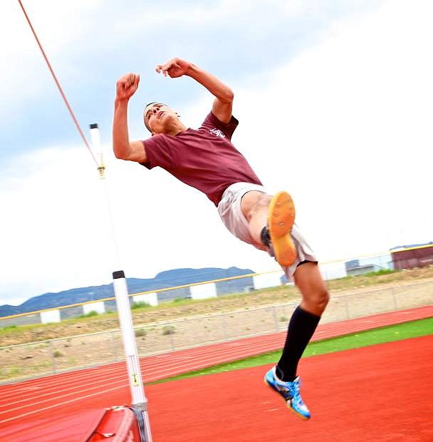Dayton senior Benji Ply practices high-jumping for the NIAA State Track Meet this weekend in Las Vegas Wednesday afternoon at Dayton High School.