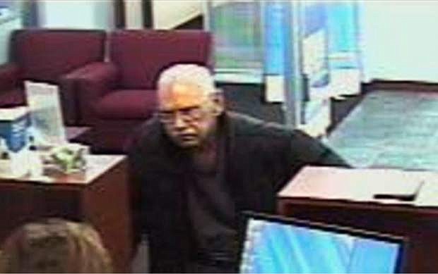 FILE - This Feb. 9, 2013 file surveillance photo provided by the FBI shows 73-year-old Walter Unbehaun, an ex-convict from Rock Hill., S.C., during a bank robbery in Niles, Ill. Unbehaun allegedly told investigators he intended to get caught so he could live his final years behind bars. On Thursday, April 17, 2014, Unbehaun is scheduled to be sentenced in Chicago. In 50 years, he has spent just six out from behind bars. His case highlights a wider societal dilemma about what to do with an increasingly elderly ex-cons, many of whom spent so much of their lives inside prison that they, like Unbehaun, can&#039;t cope with life on the outside. (AP Photo/FBI, File)