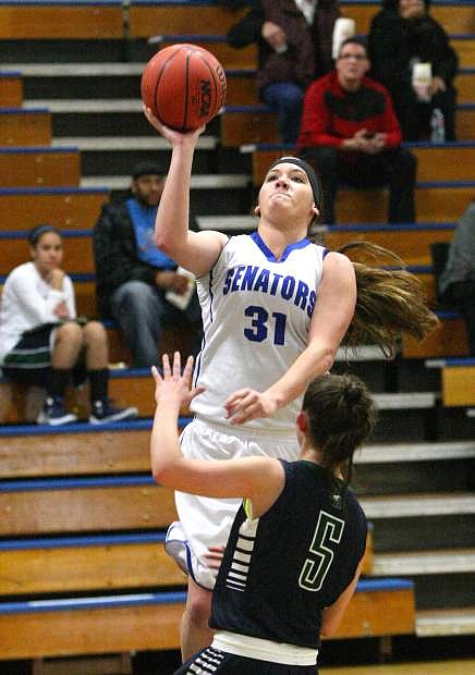 Haley Garver drives to the basket in a game against Damonte Ranch on Tuesday.