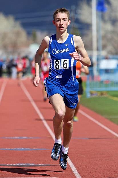 Carson&#039;s Ian Van Rensselaer crosses the finish line for 3rd place in the boy&#039;s 1600 meter event Saturday which was won by Douglas&#039; John Munyan.