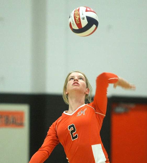 Aubrey Caires of Douglas serves in a match against Fallon on Tuesday.