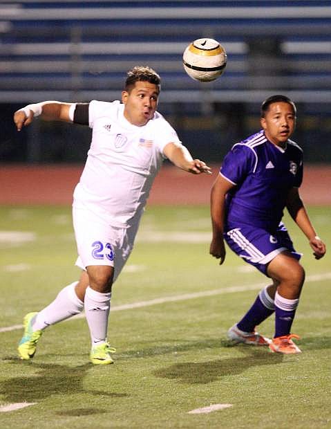 Carson&#039;s Ryan Galvan goes after a ball against Spanish Springs Friday night at CHS.