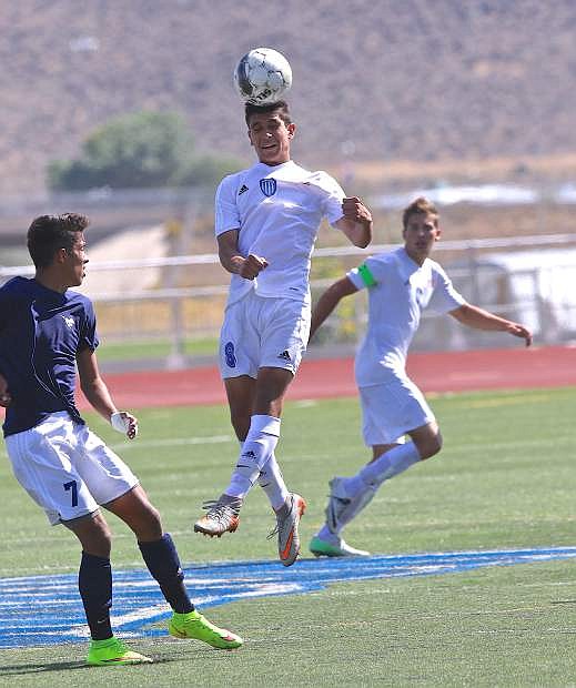 Senator mid-fielder Alejandro Gonzales heads the ball during a game with Damonte Ranch Saturday at the Jim Frank Track and Field Complex.