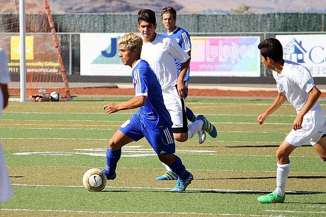 Guillermo Hernandez controls the ball for Carson on Saturday.