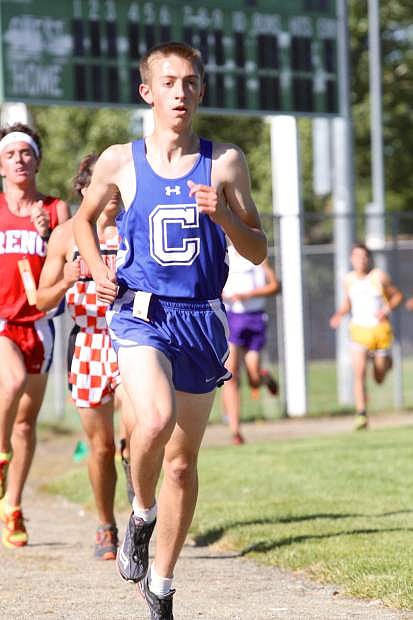 Ian VanRensselaer is the first male finisher for Carson High during the junior class event at Lampe Park last year.