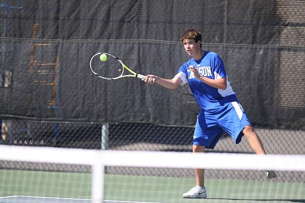 Singles player Josh Breen returns a volley in his match against Galena on Tuesday.