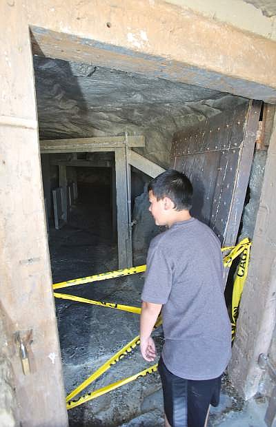 10-year-old David Stoffer looks into &#039;the hole&#039; at the Nevada State Prison Saturday afternoon.