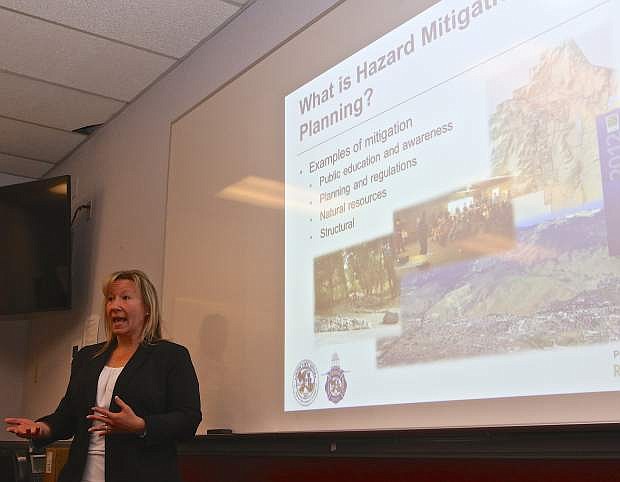 Stephanie Hicks, Director of Grants and Hazard Mitigation Planning for R.O. Anderson adresses the group at the Carson City Fire Station Thursday afternoon.