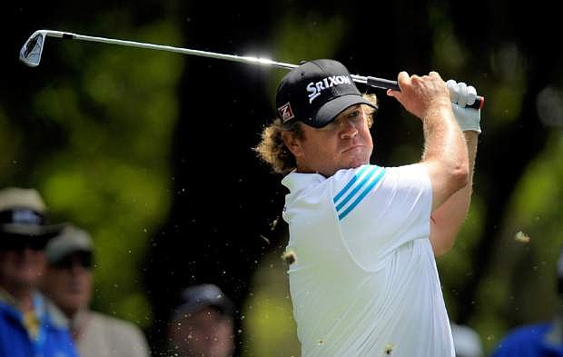 William McGirt watches his drive off the ninth tee during the first round of the RBC Heritage golf tournament in Hilton Head Island, S.C., Thursday, April 17, 2014. (AP Photo/Stephen B. Morton)