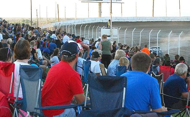 Fans pack the stands during Friday&#039;s Fourth of July races at Rattlesnake Raceway.