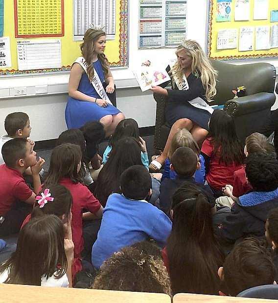 Miss Carson City Samantha Byassee and Miss Lake Tahoe Brooklyn Maw read to students at Empire Elementary School for Nevada Reading Week. One of the classrooms they visited was Vannesa Macias who was Miss Carson City 2012.