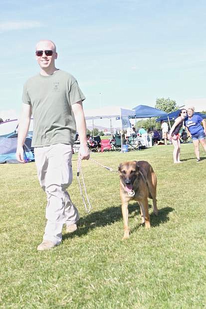 CCSO K9 Officer Darin Riggin and his Belgian Malinois &#039;Tarzan&#039; do laps during the Relay for Life in Carson City Saturday.