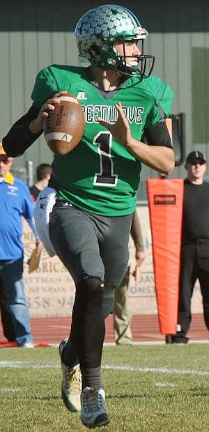 Connor Richardson sets up for a touchdown pass in the Greenwave&#039;s state championship victory.