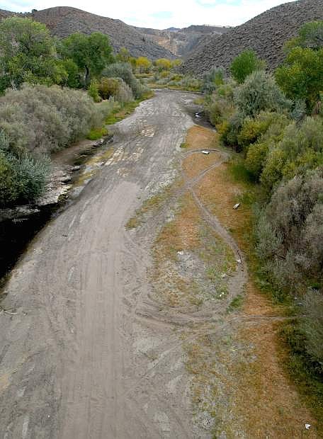 A before picture of the Carson River taken on Sept. 15, 2015 from the Deer Run Road bridge shows no water in the river compared to a photo taken yesterday, Monday, May16, 2016.