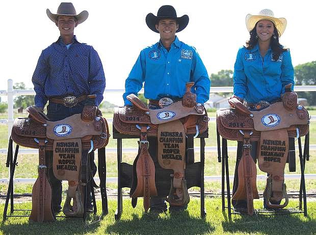 Caleb, left, and Cord Hendrix, middle, said the memory of their sister, Rachel, has lifted them to next week&#039;s National High School Finals Rodeo in Rock Springs, Wyo. Fellow Fallon cowgirl Sydney Howard, right, also competes at nationals.