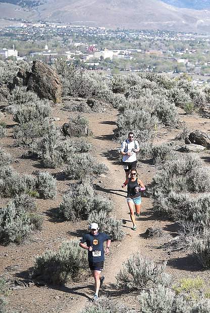 Runners participate in the Escape from Prison Hill half-marathon and 10K in Carson City, Nev., on Saturday, April 19, 2014.