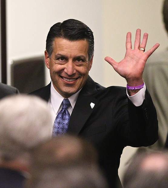 Governor Brian Sandoval enters the legislative assembly chambers on Thursday night for his state of the state address.