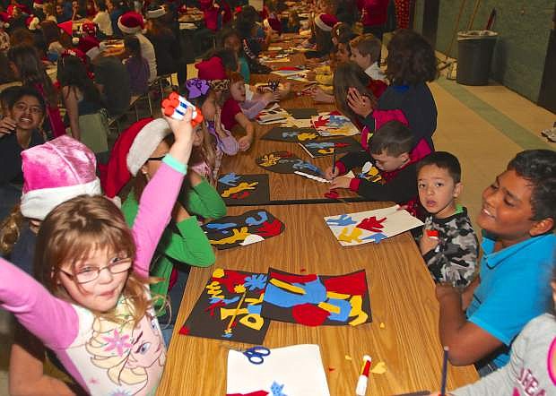 Students at Bordewich-Bray Elementary work on artwork inspired by Henri Matisse Friday.